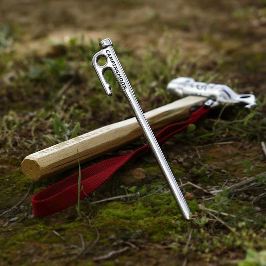 Nomadia Accessory Forged Camp Pegs and a hammer - camping essential - tent pegs - camping gear