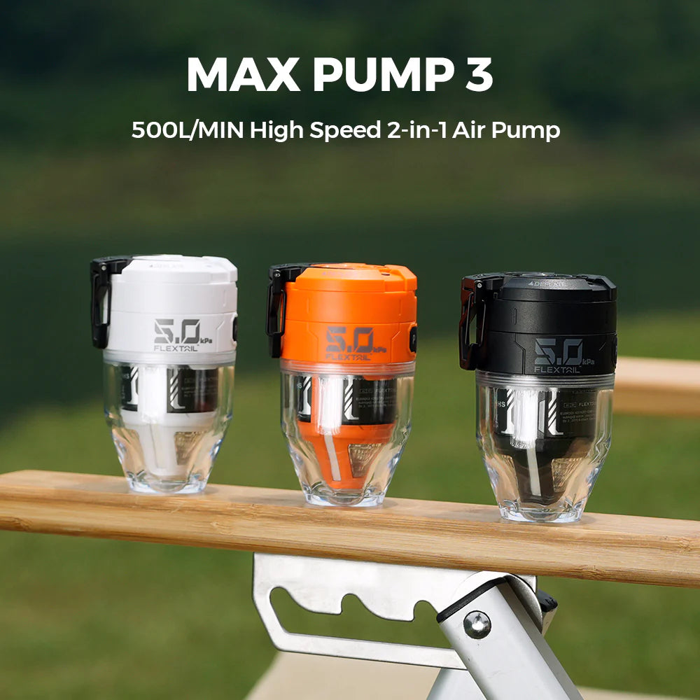 Three Nomadia Accessory High Speed 2-in-1 Rechargeable Air Pump air pumps on a wooden surface with a blurred green background Max Pump 3 - multi-use - multipurpose