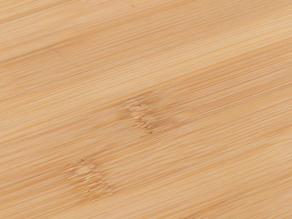 Close-up of Nomadia CampStation Bamboo Chopping Board with a natural pattern - camping gear - uk camping