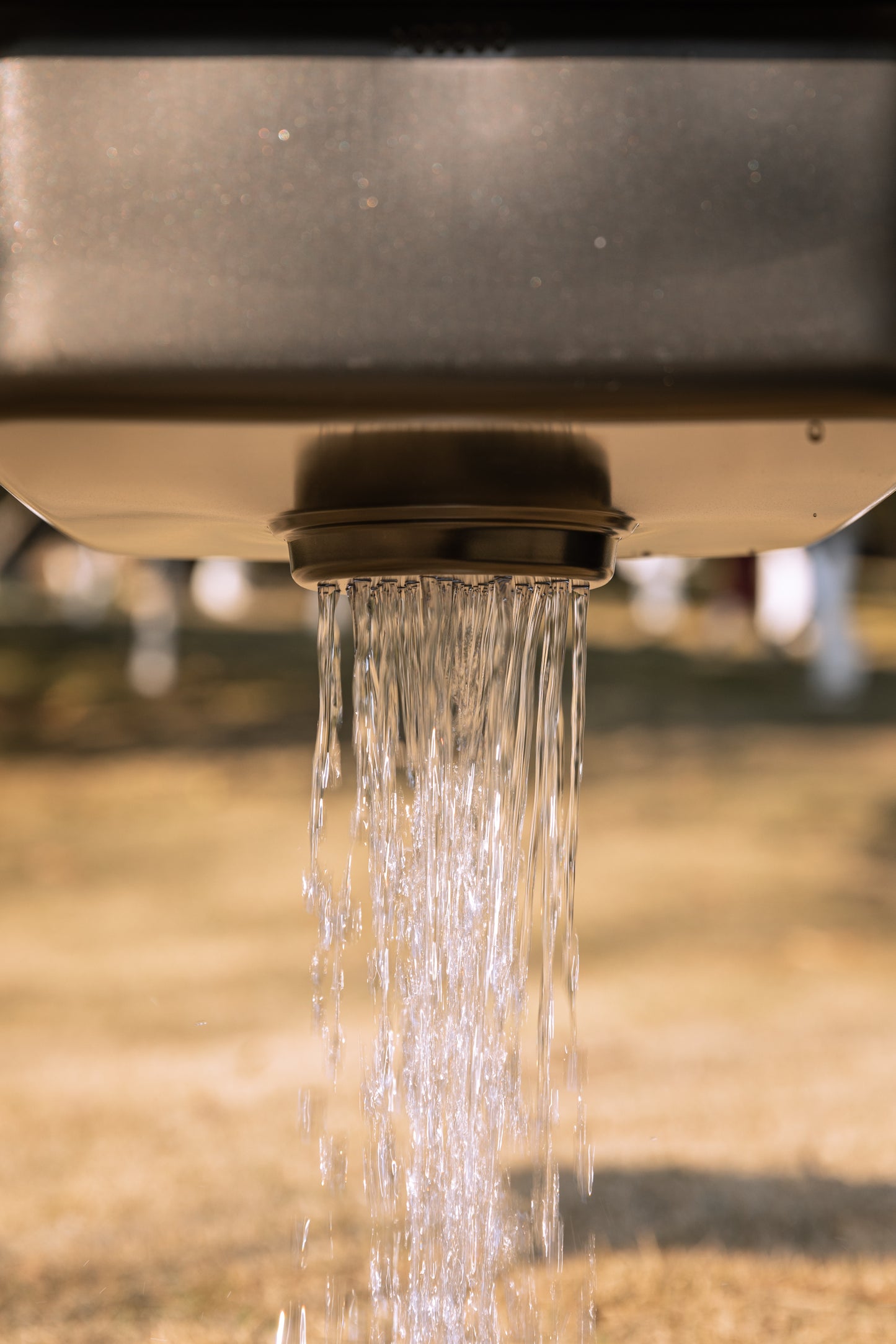 close up of drainage of Nomadia CampStation Kitchen Sink - camping gear - outdoor cooking equipment