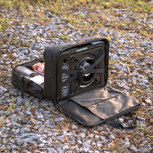 Black portable Nomadia CampStation Storage Bag on a gravel surface - uk camping - large storage compact camper bag