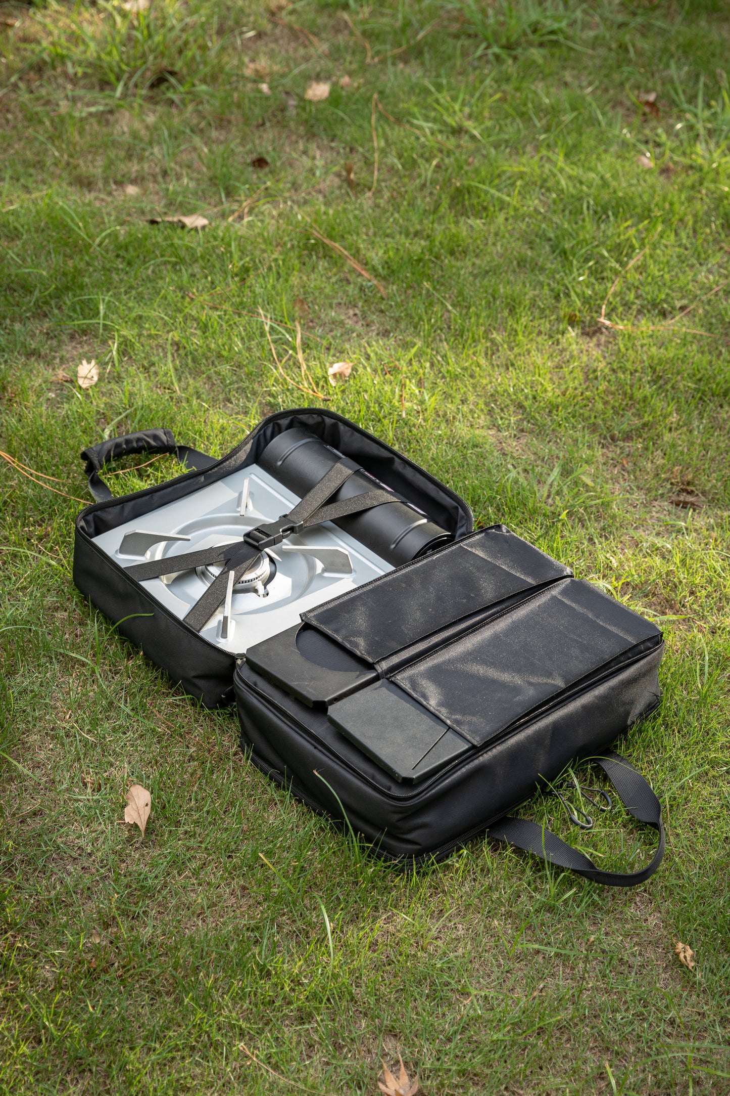 Black carrying case with compartments - large storage bag for modular camping table - compact storage bag