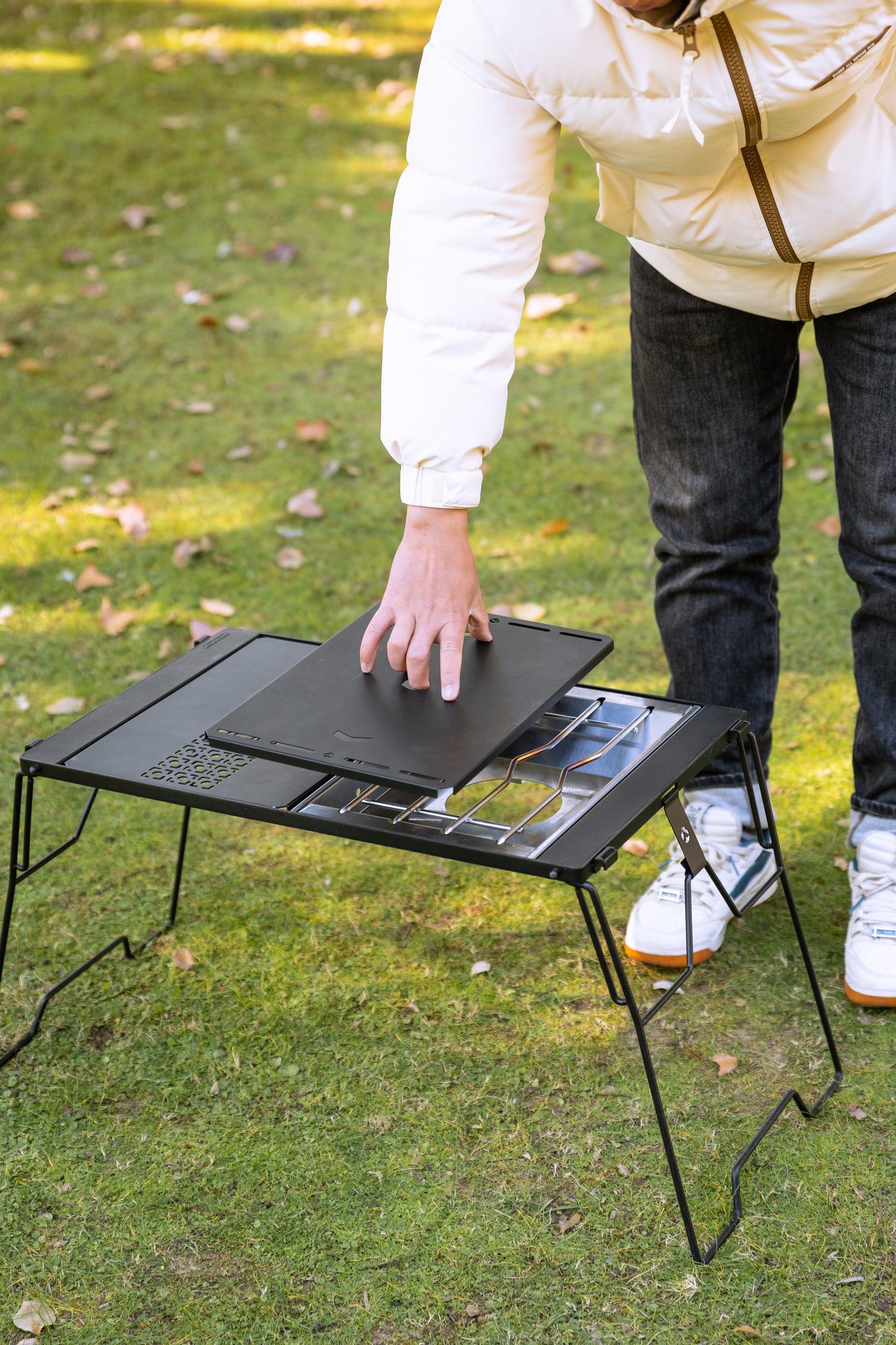 setting up Nomadia CampStation Stove Set as a table top on a modular camping table - stove set with lid - outdoor cooking equipment