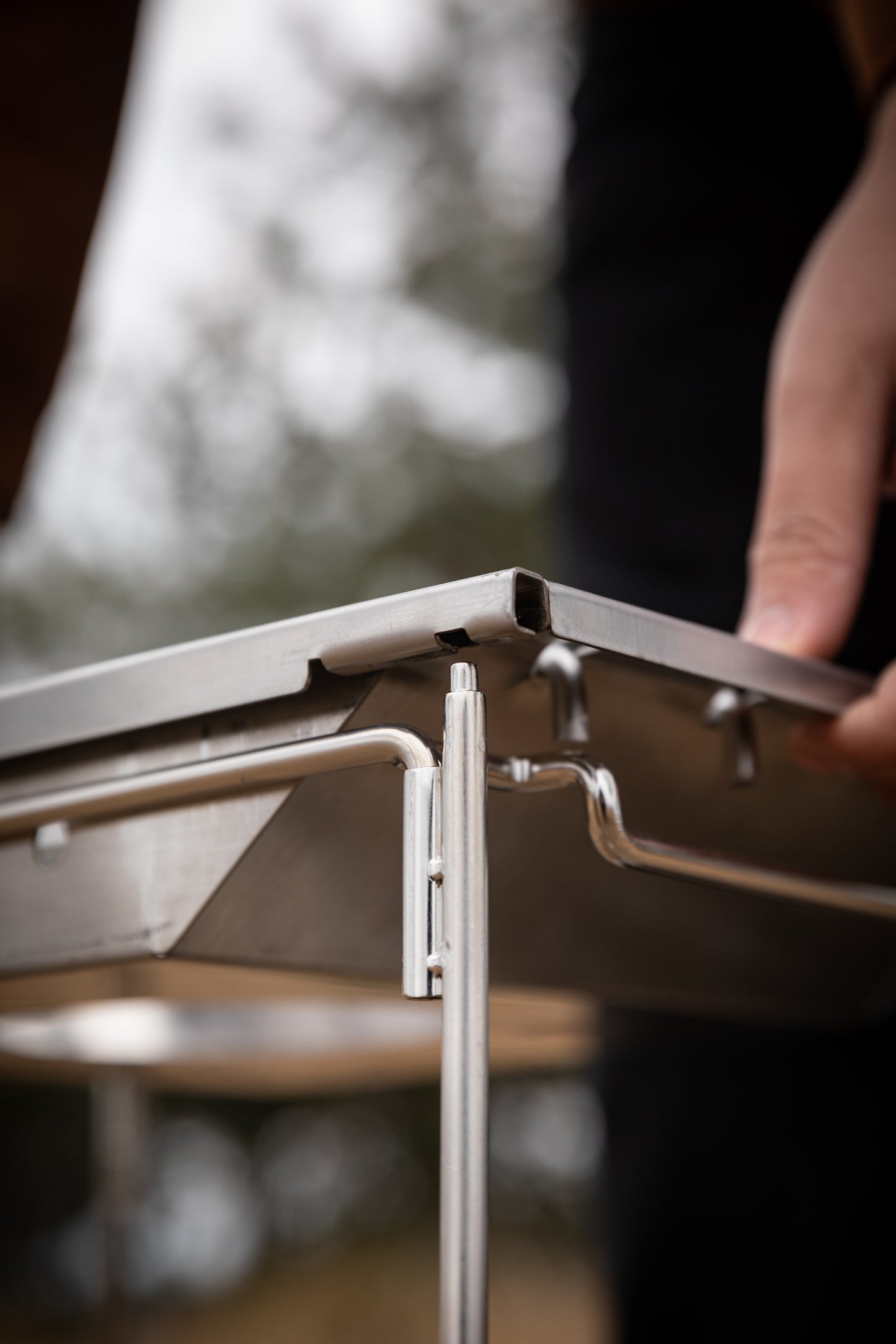 Close-up of Nomadia CampStation Stove Set on a metal folding table - uk camping