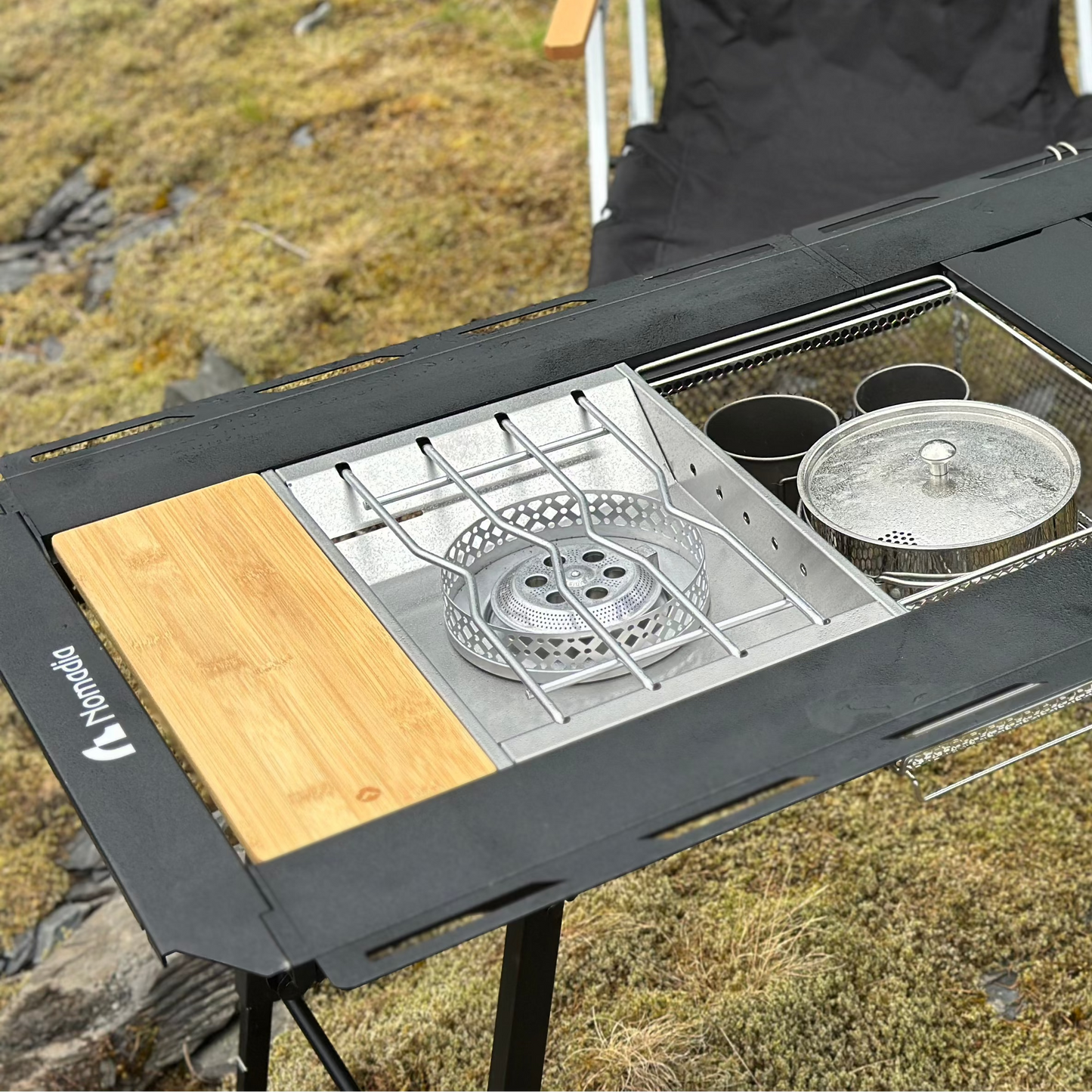 Nomadia_CampStation Portable Folding Heavy Duty Compact - Camping Table Table Set with Modular Flexibility - Modular Camping Table water dispenser - stainless steel coffee pot - stove set - sink - mesh basket - camping - lifestyle - grassland