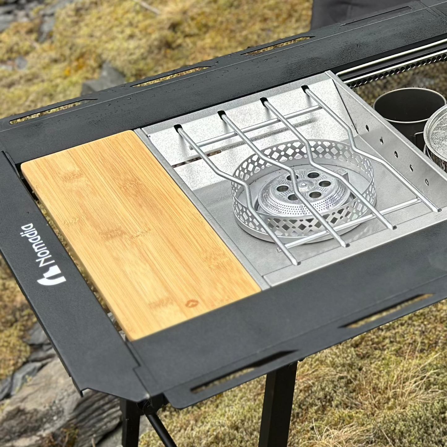 Nomadia_CampStation Portable Folding Heavy Duty Compact - Camping Table Table Set with Modular Flexibility - Modular Camping Table water dispenser - stainless steel coffee pot - stove set - sink - mesh basket - camping - lifestyle - grassland