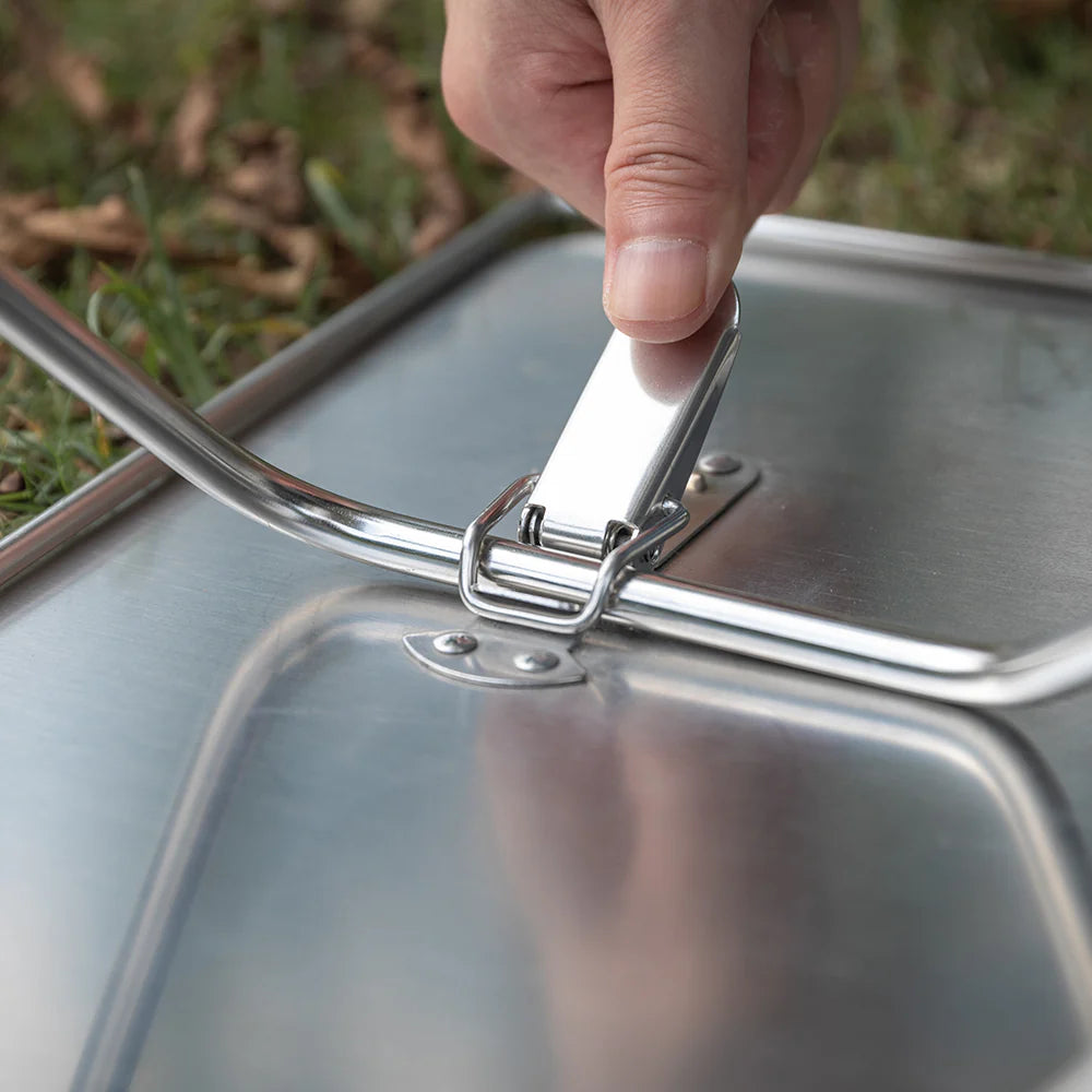 close up of a latch of Nomadia's Flamo Portable Folding BBQ Grill and Fire Pit - camping gear - uk camping