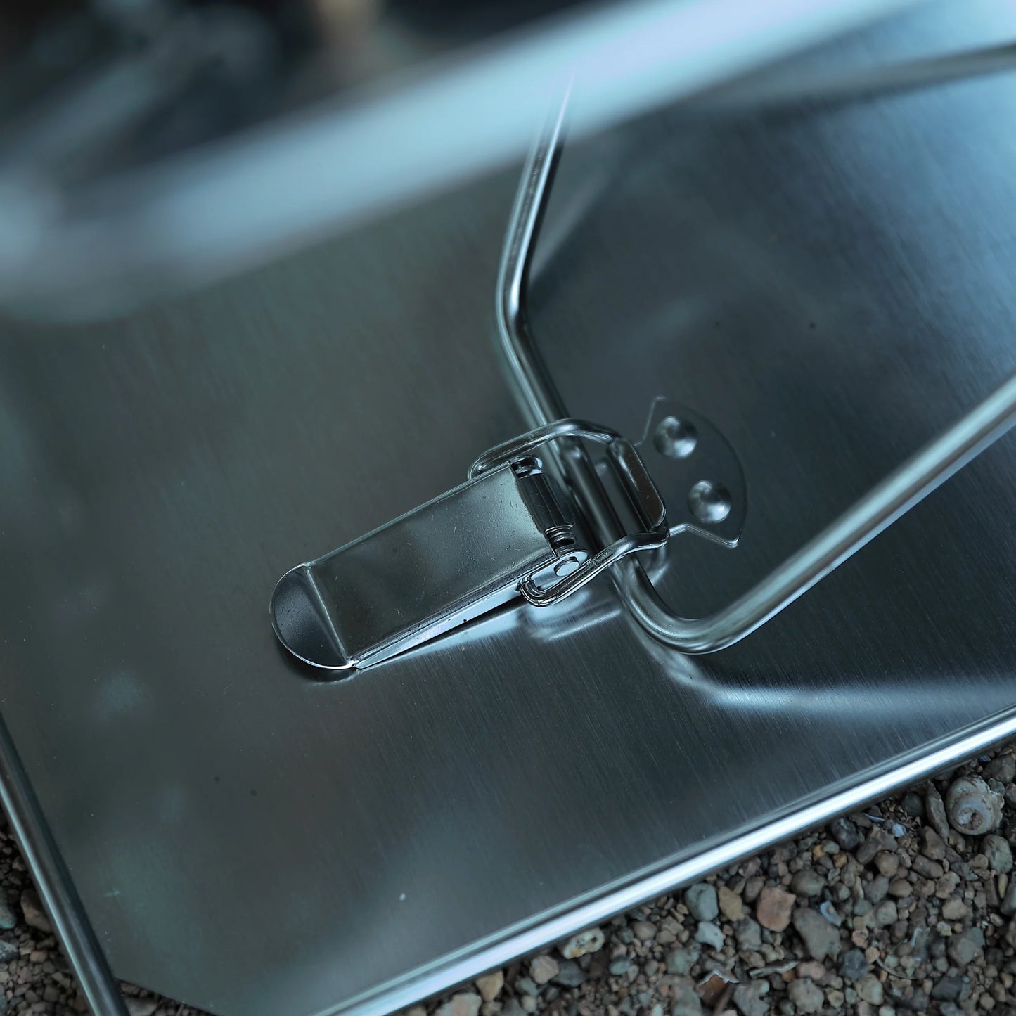 close up of a latch on Nomadia's Flamo Portable Folding BBQ Grill and Fire Pit - wild camping - camping gear