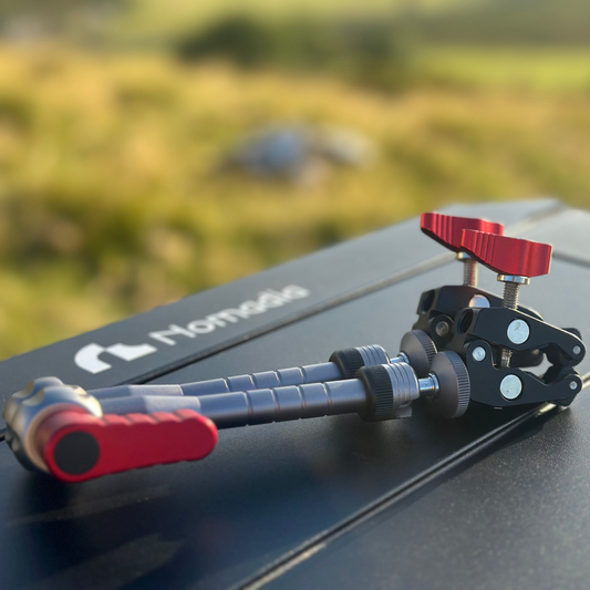 Camera stabilizer on a car roof Nomadia FlexArm Dual Clamp -camping gear - camping essential