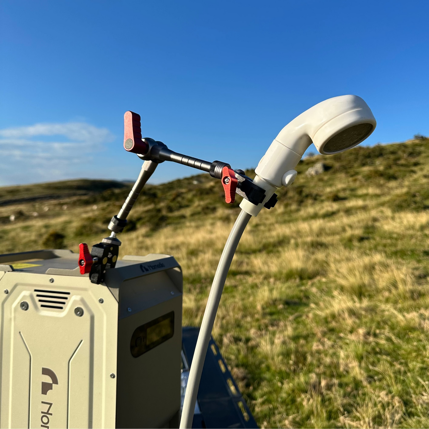 Nomadia FlexArm Dual Clamp with thermoflow shower system for easy showering outdoor - camping gear - multi-surface fit - uk camping - portable shower for camping