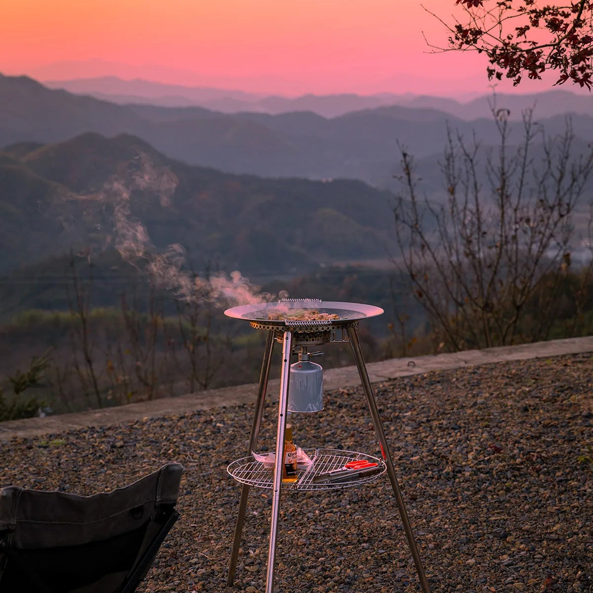 Nomadia Horizon Cook portable outdoor cooking station for sharing in outdoor setting with sunset view - portable grill pan - outdoor cookware for groups - multi-function camping stove