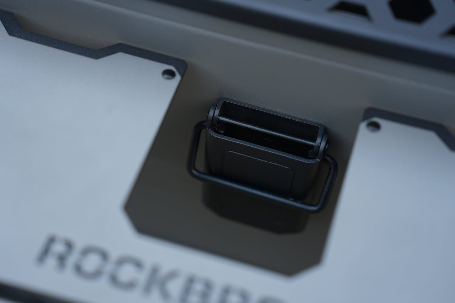 Close-up of a black connector on Nomadia ModoBox 2in1 camping table and storage box - camping gear - glamping - uk camping