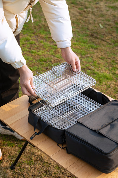 metal mesh basket folded ready to be put into the storage bag - camping gear - easy storage - glamping