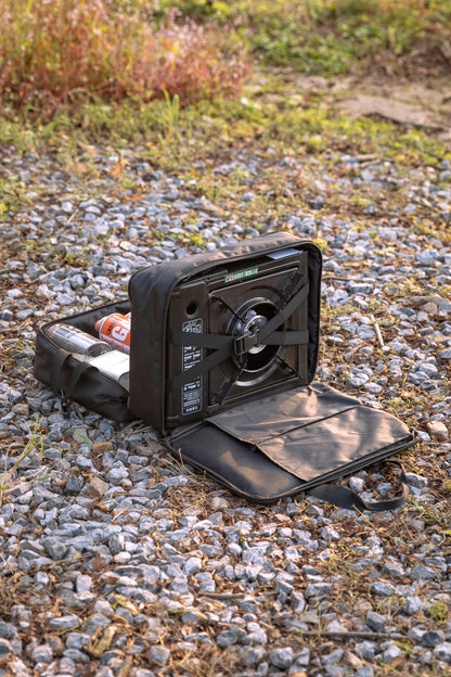 Black portable Nomadia CampStation Storage Bag on a gravel surface - uk camping - large storage compact camper bag