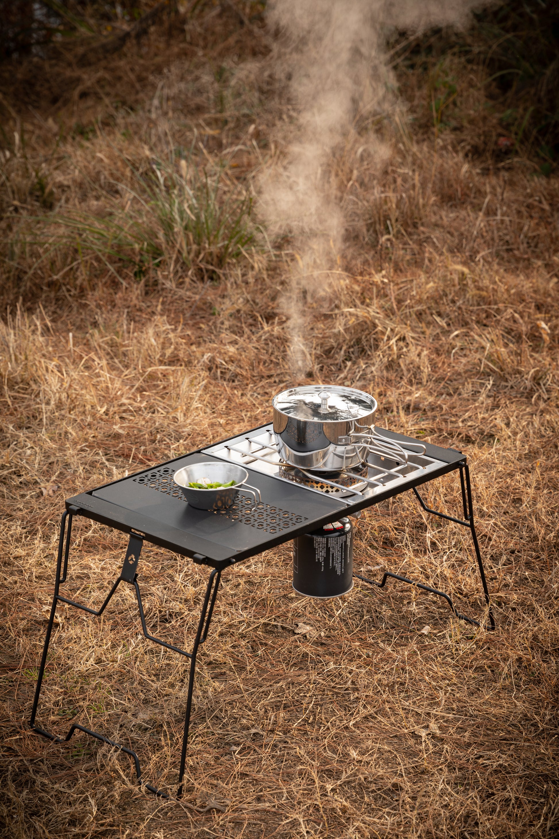 Portable Nomadia CampStation Stove Set with pots and pans on a modular camping table - uk camping - outdoor cooking facility - glamping 
