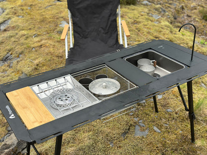 Nomadia_CampStation Portable Folding Heavy Duty Compact - Camping Table Table Set with Modular Flexibility - Modular Camping Table water dispenser - stainless steel coffee pot - stove set - sink - mesh basket - camping - lifestyle - grassland