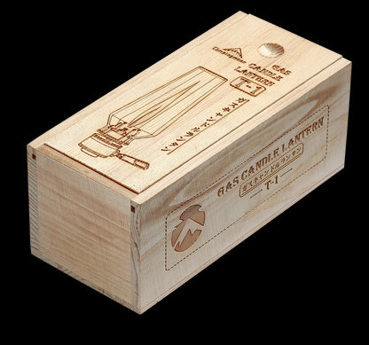 Wooden storage box for vintage-styled camping gas lamp with engraved design and text on a white background - portable - lightweight - wildcamping