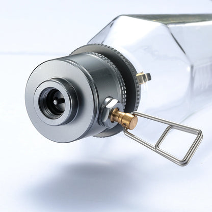 Close-up of a metal valve or fitting of the vintage styled camping light bulb with a white background - wildcamping - camping lamp