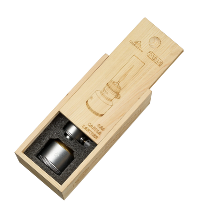 Wooden box with a silver candle holder inside for Nomadia Camping Light Candle-Style Gas Camping Lamp Set