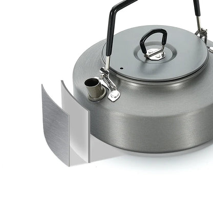 Metallic Nomadia fast boil camping kettle for gas stove with handle on a white background - campervan kettle - small lightweight portable camping kettle 